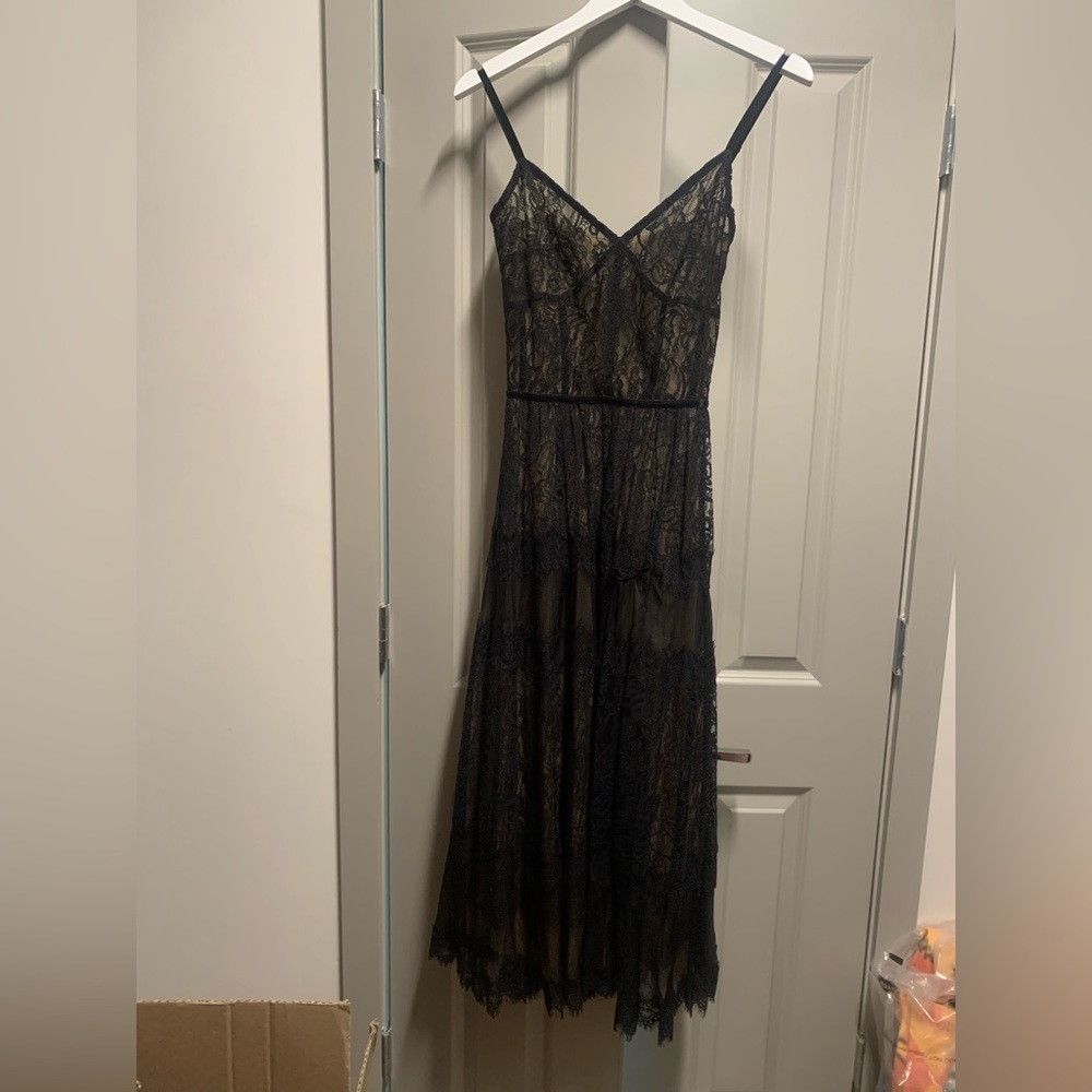 Black sheer lace dress.